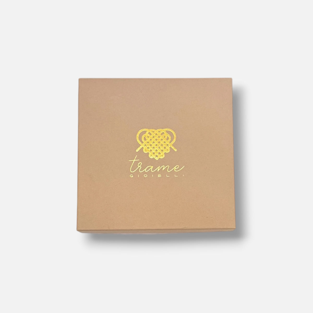 Scatola esterna del calendario Un filo alla volta, chiusa, con il logo Trame gioielli