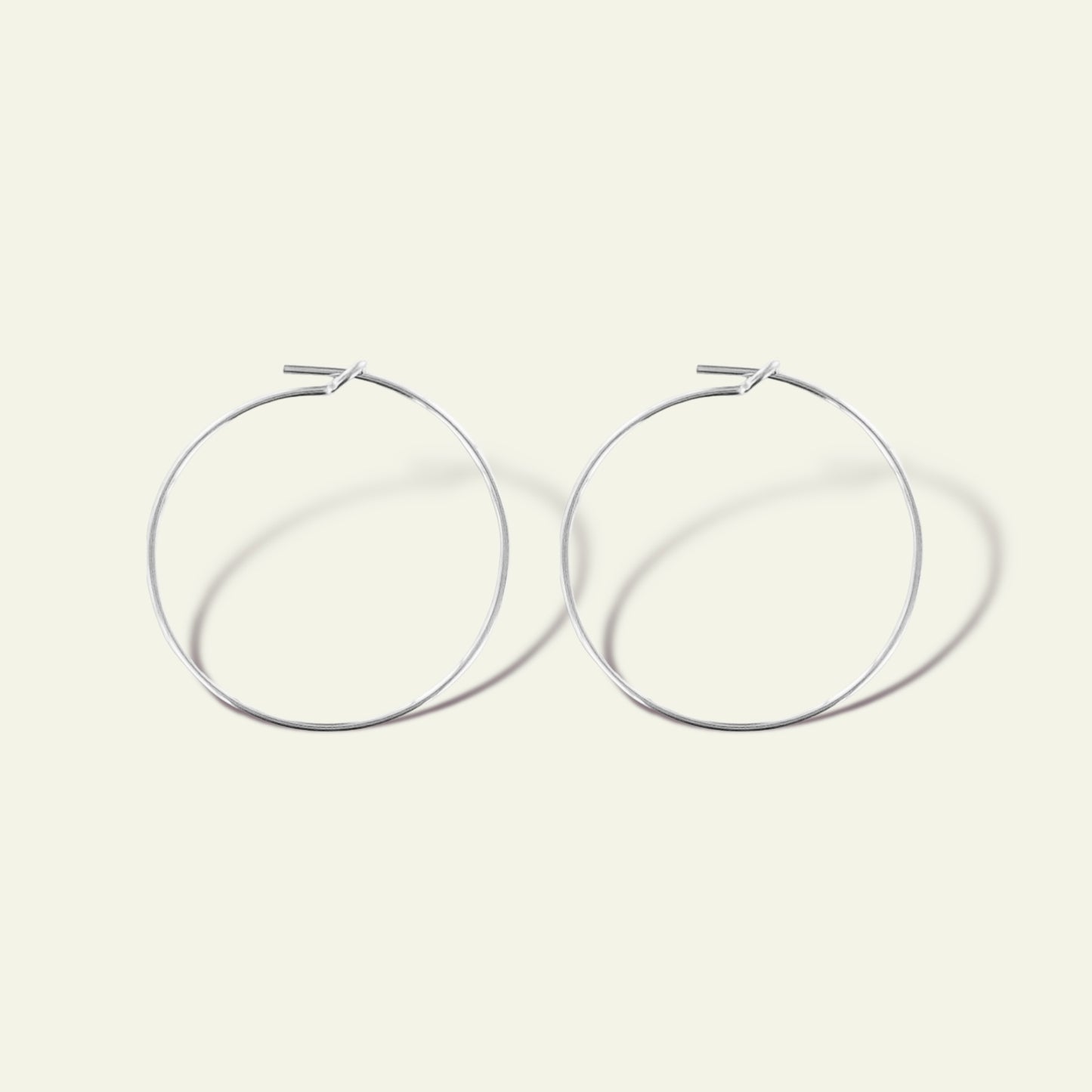 coppia di orecchini a cerchio in sottile filo argento finitura oro rosa