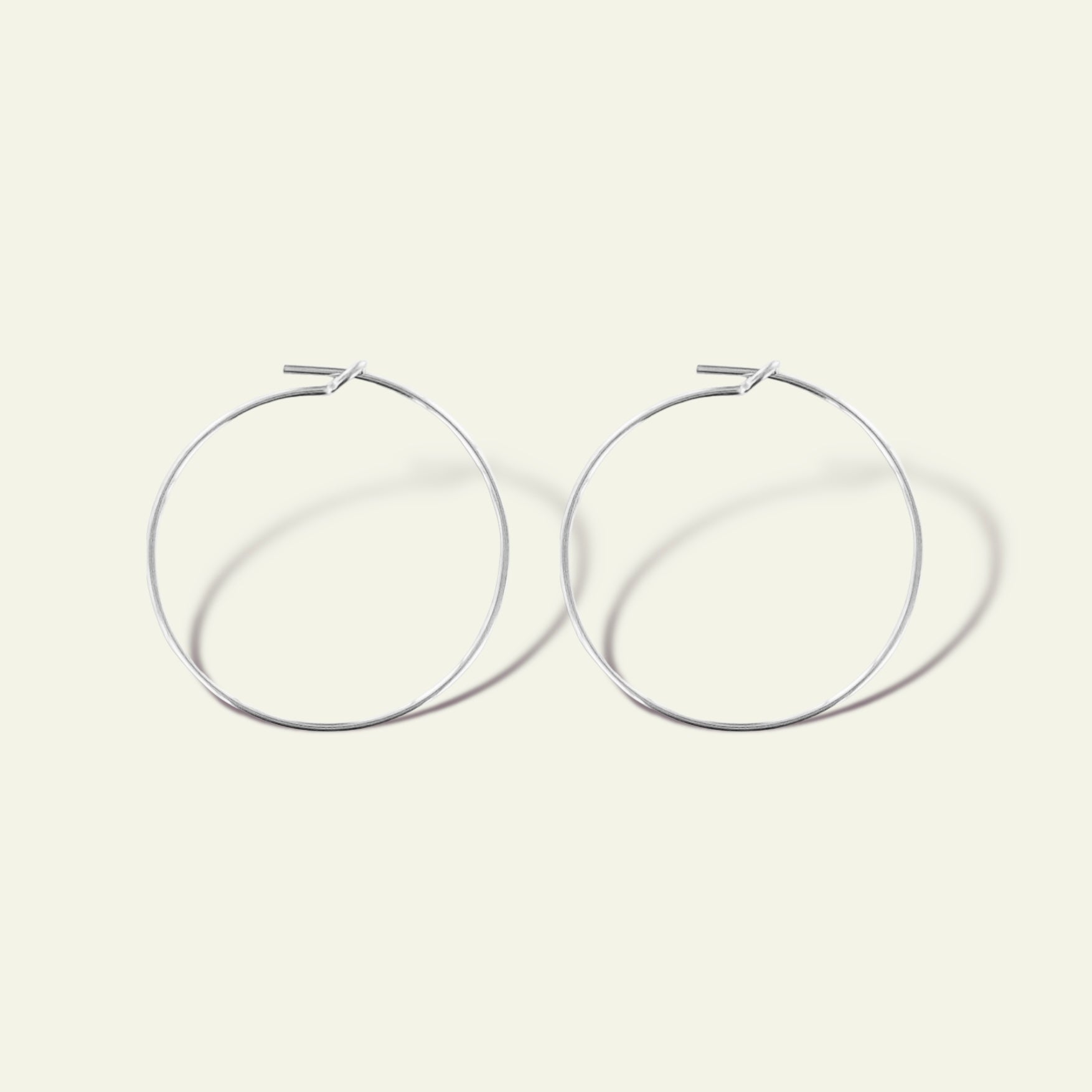 coppia di orecchini a cerchio in sottile filo argento finitura oro rosa